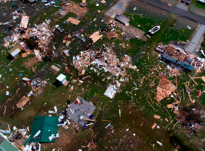 An aerial view of a neighborhood outside of Lake Charles. Photo by STRINGER, AFP via Getty Images. 
