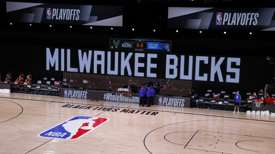  On August 26, the Milwaukee Bucks and the Orlando Magic protested their 5th Game of the NBA first-round playoff series leaving an empty court and refs alone in a huddle.

Photo by: (Kevin C Cox/Getty)
