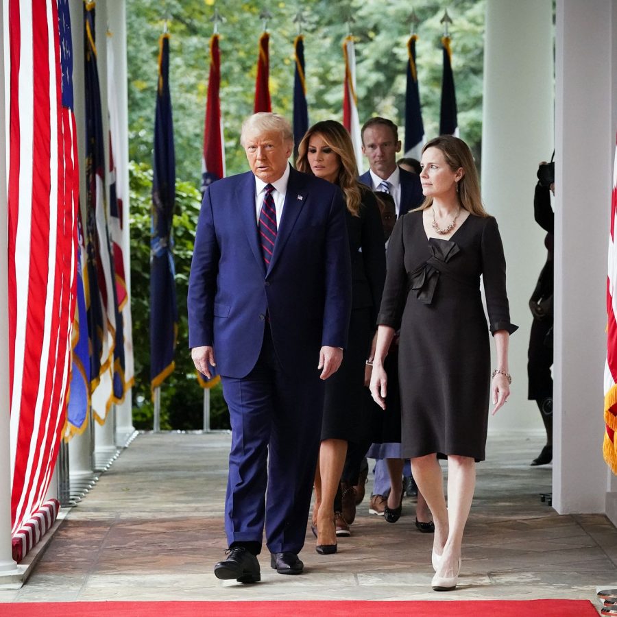 Amy Coney Barrett walks alongside President Trump to announce her nomination.
Photo by Alex Brandon/AP