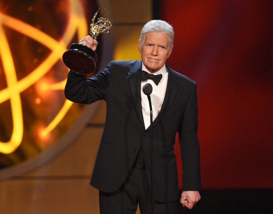 Alex Trebek accepts an Emmy for Outstanding Game Show Host in 2019, his sixth and final Emmy Award. 
Photo by Chriz Pizzello. 

