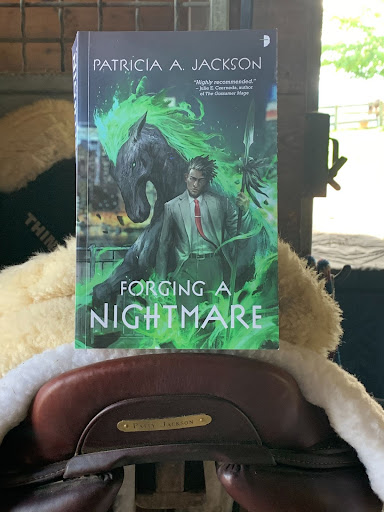 Jackson took inspiration from her love of horses into a character, Anaba Raines, a nightmare (warhorse built for a fallen angel). 