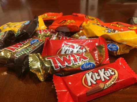 This photo includes Reese’s Peanut Butter Cups, Twix, Kit Kat and Milky Way.