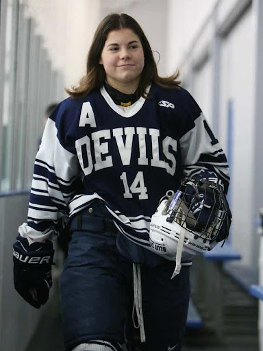 Abby Roque made history in her hometown as the only girl on the hockey team.