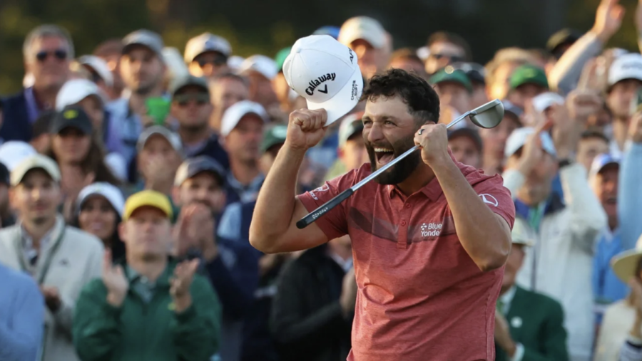 John Rahm celebrates after sinking his last putt on the 18th green to become the Master’s Champion.
