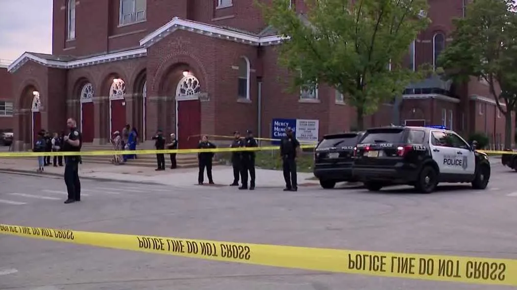 Police tape blocks a Milwaukee street near the scene of a shooting investigation