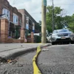 Crime scene tape outside 882 Albany Ave. in Brooklyn after a fatal stabbing