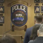 NYPD officials and families gather at Floyd Bennett Field for ESU Memorial Wall rededication